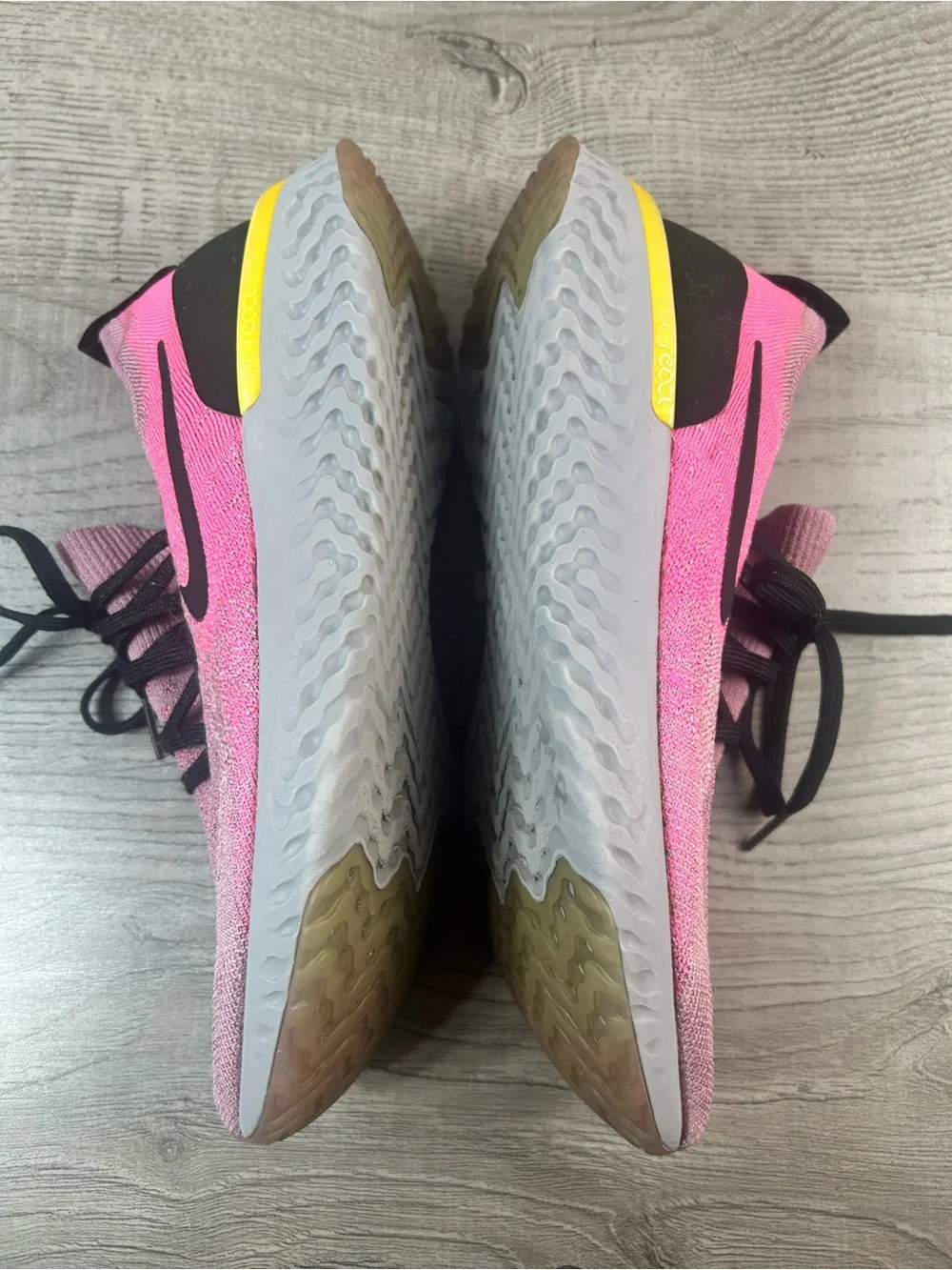 Nike women’s Epic React Flyknit 10.5Pink Black Running Sneakers with Yellow Heel